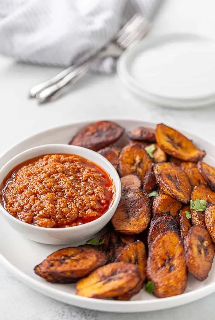 Fried plantain with pepper sauce